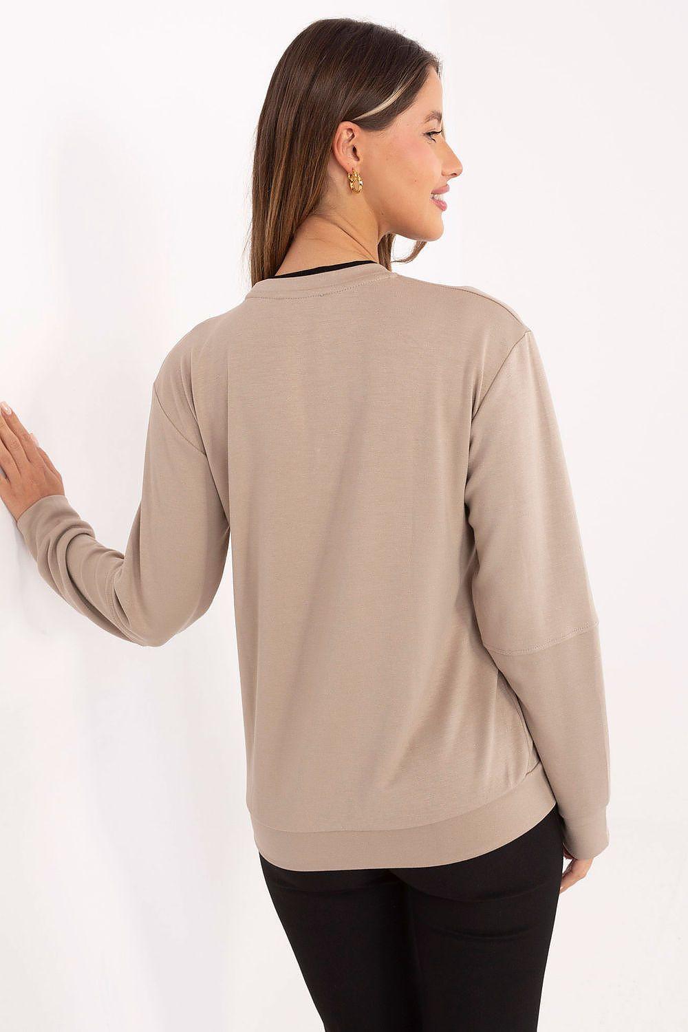Soft long-sleeve blouse in beige with banded neckline, back view in profile