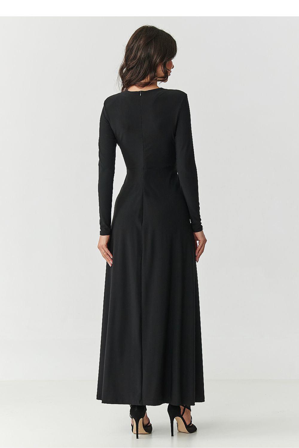 Black long-sleeve maxi dress back view with pleated skirt