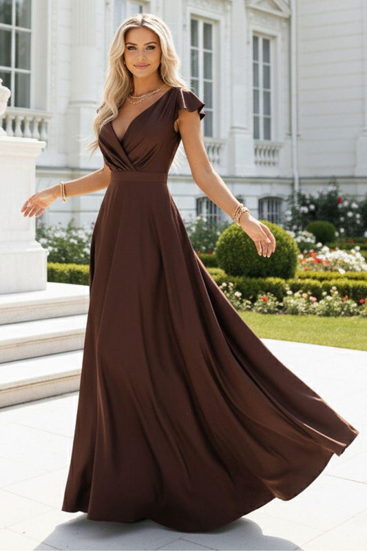 Long brown maxi dress by Numoco with cap sleeves, V-neck wrap bodice, flowing skirt