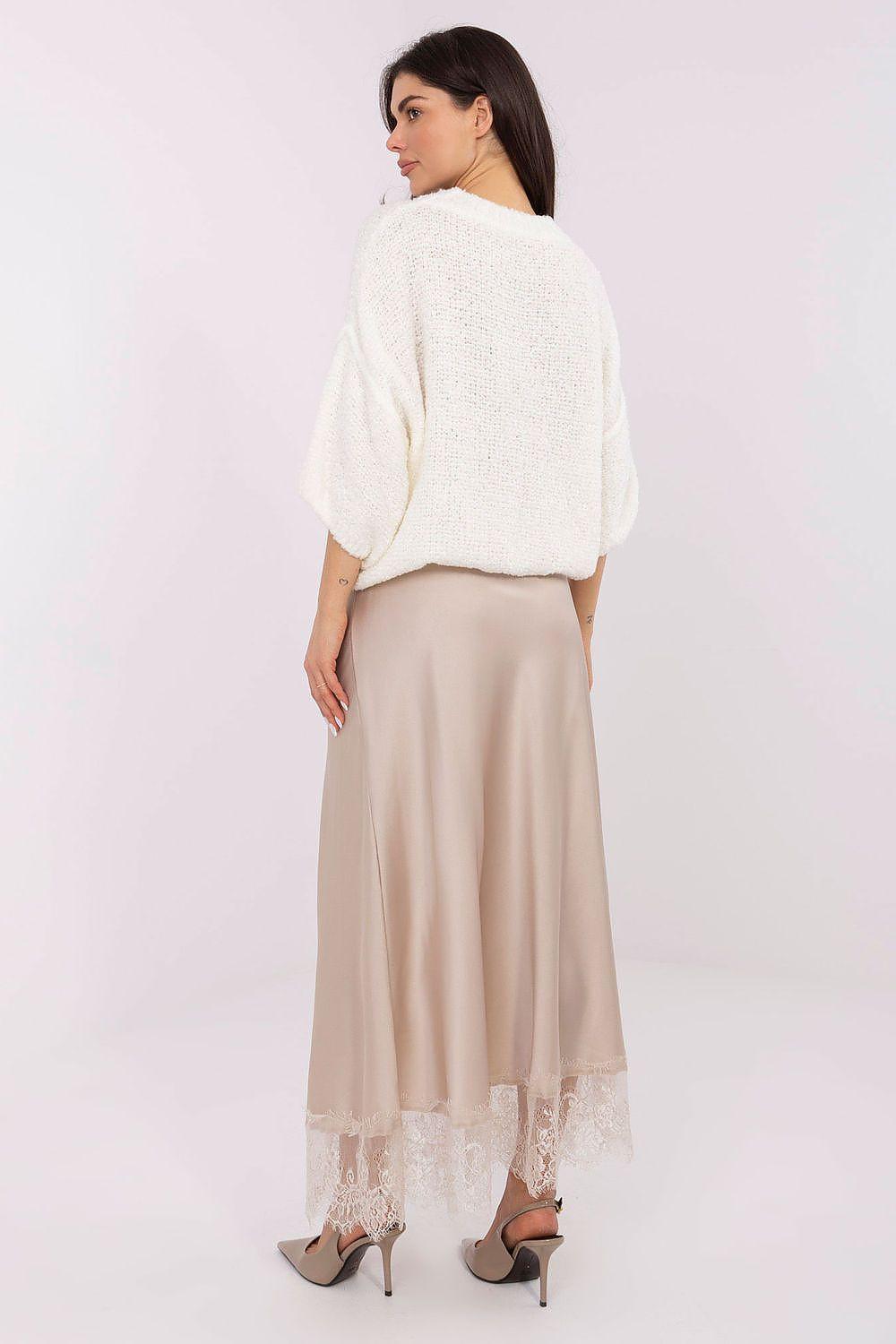Beige long skirt with lace-trim hem, back view with slight flare
