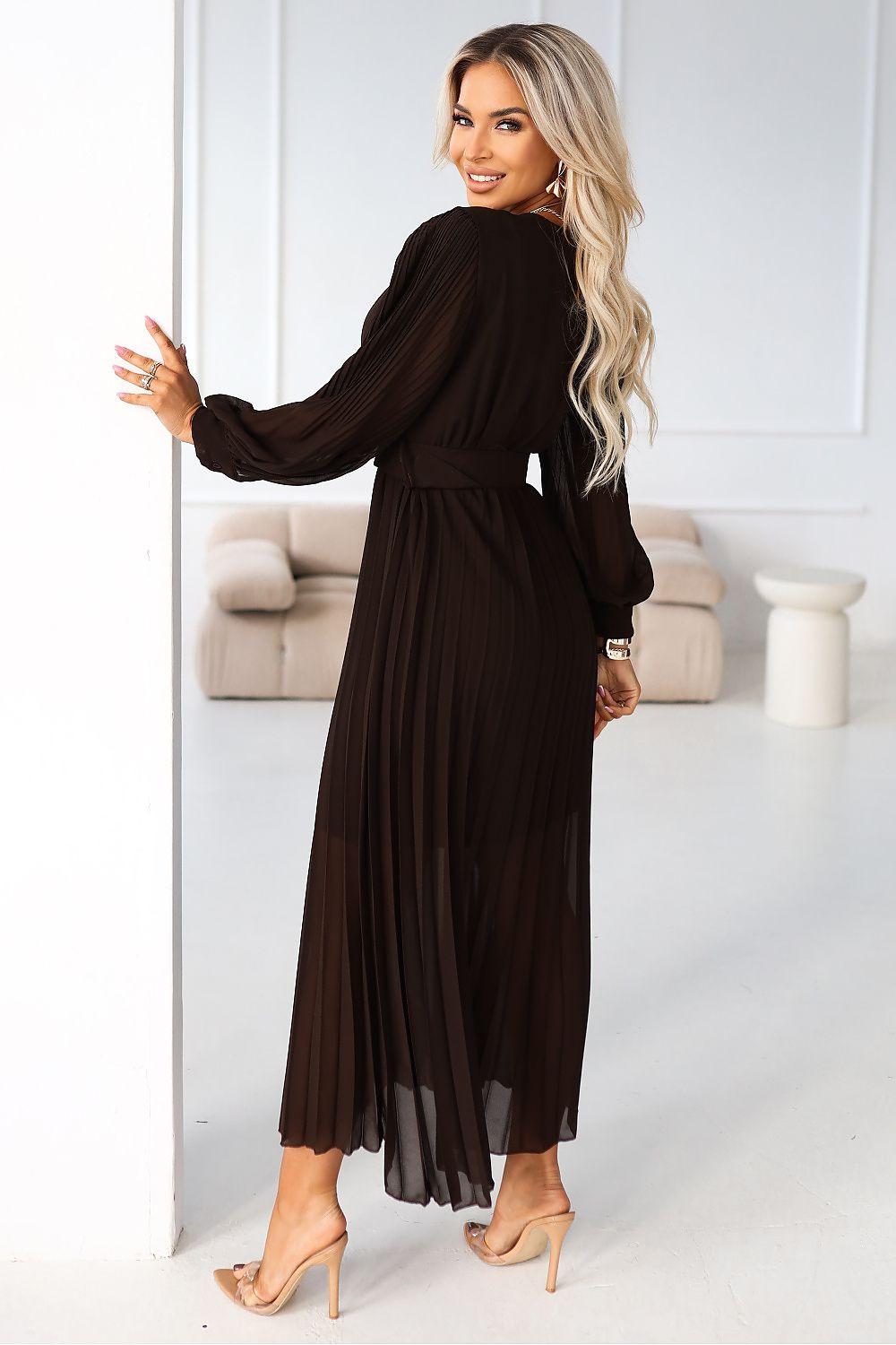 Pleated chiffon cocktail dress with V-neck, long sleeves, waist belt, black full length.