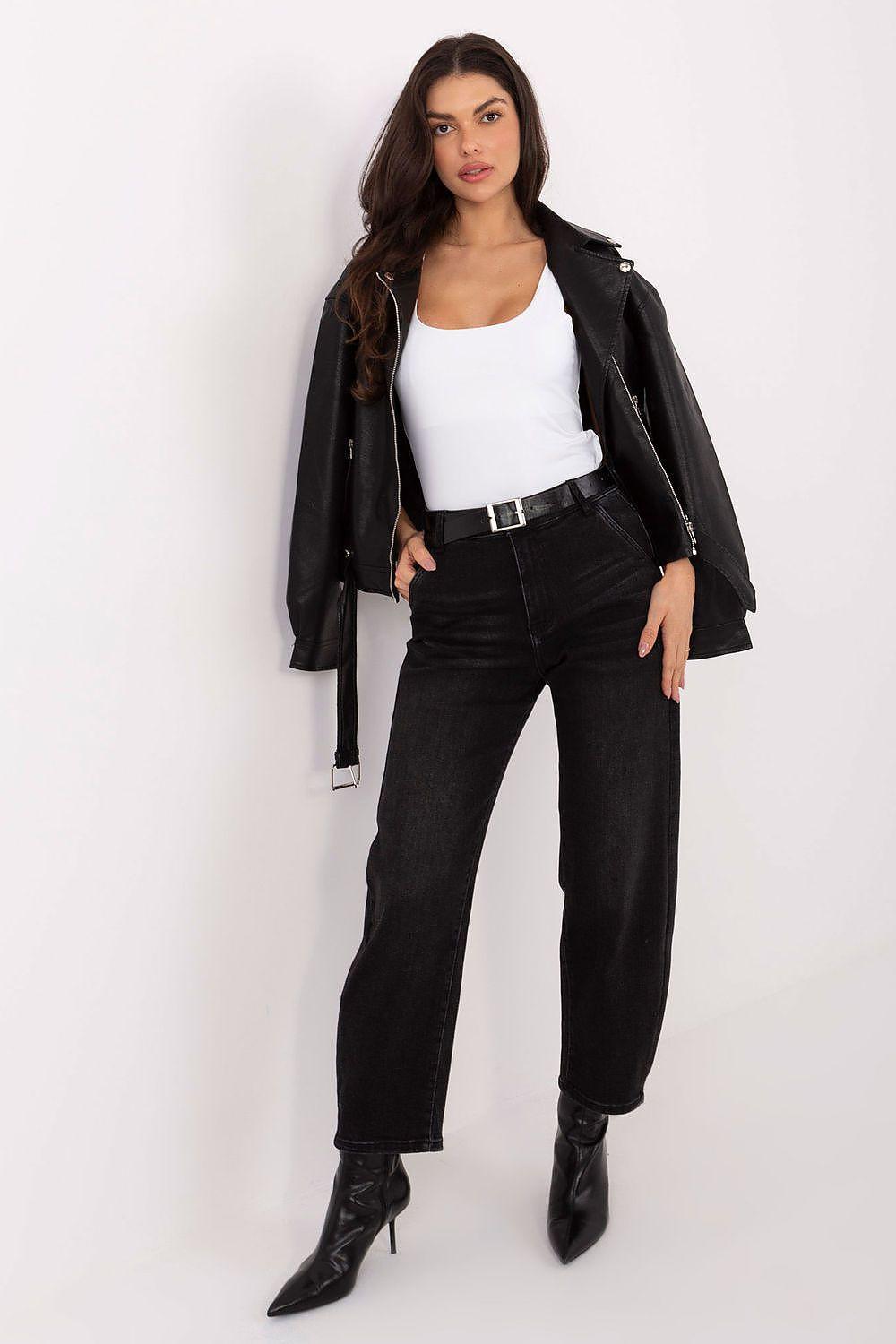 Sleeveless white top with scoop neckline, worn under black jacket.