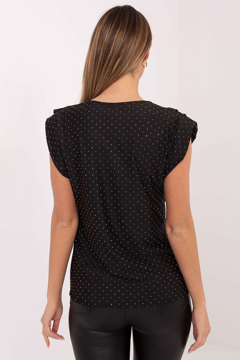 Sleeveless blouse in black with tiny dot print, back view.