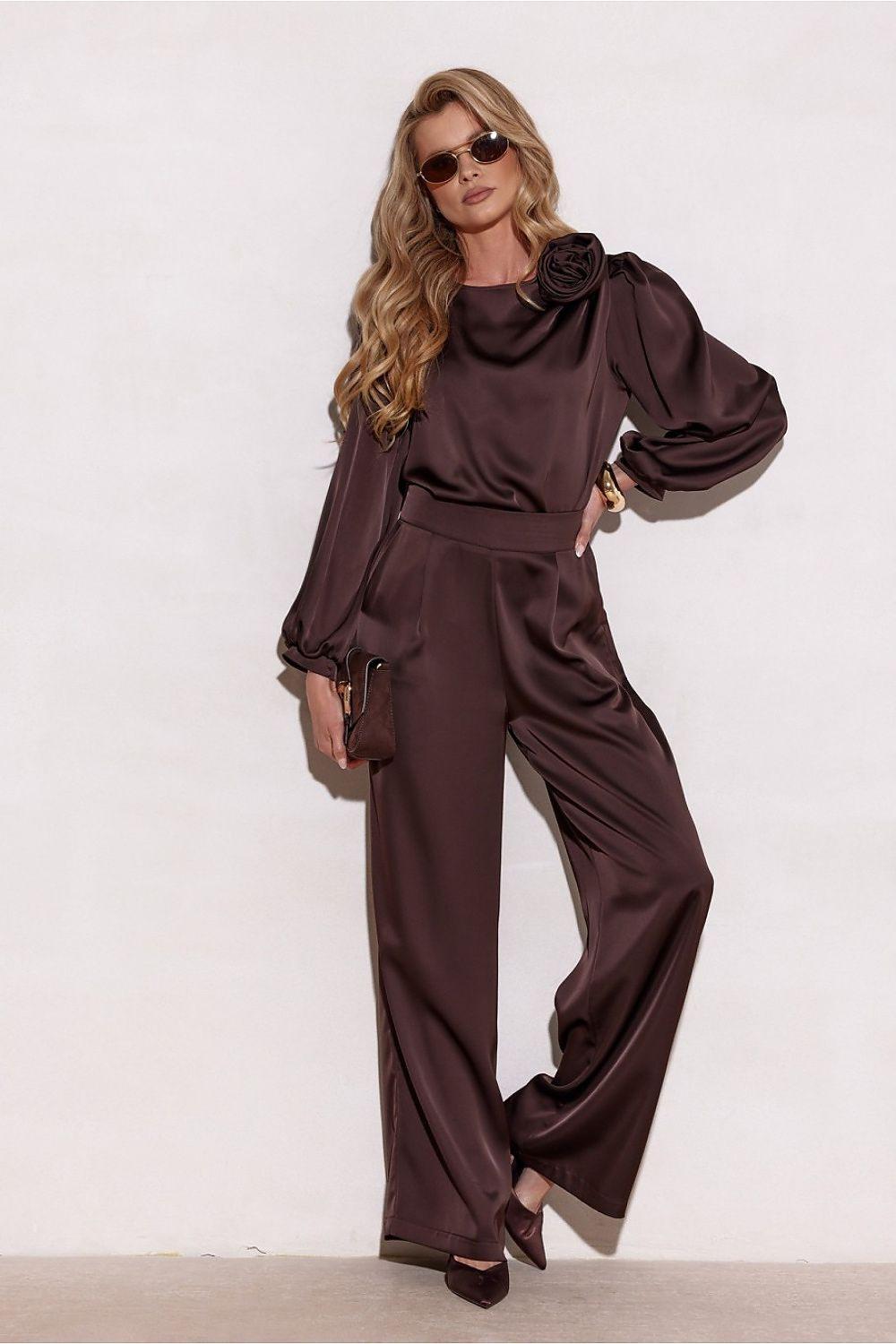 Dark satin blouse with rose cowl neck, gathered waist, and puff sleeves