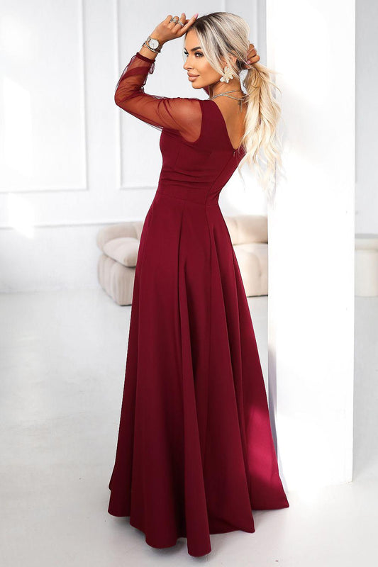 Burgundy maxi dress with fitted bodice, sweetheart neckline, sheer tulle long sleeves