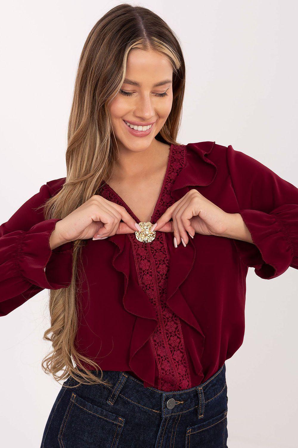 Red blouse with ruffle neckline and lace front panel, gold-toned detail