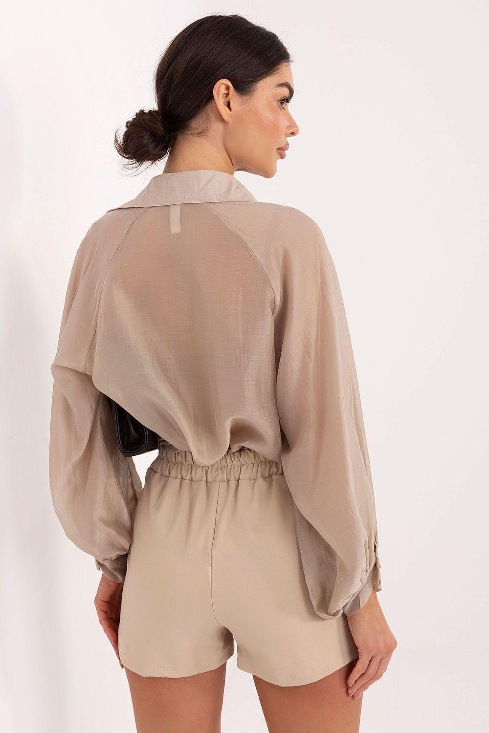 Beige skort back view with gathered elastic waistband and shorts lining