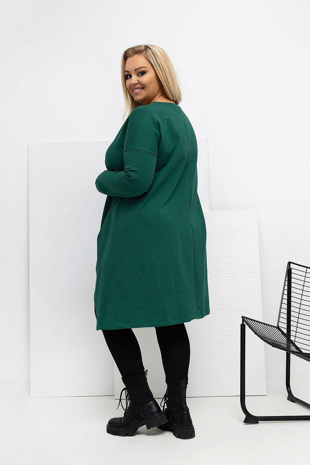 Plus-size green tunic long sleeve with asymmetrical hem, side view