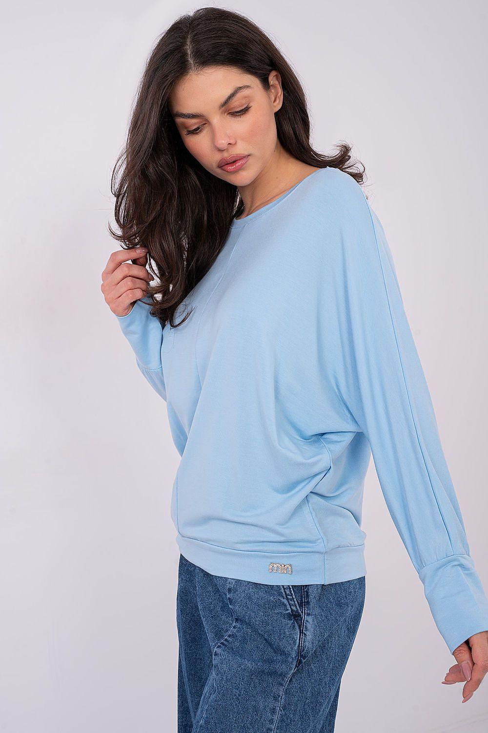 Light blue long-sleeve crew-neck blouse with relaxed drape and side seam detail