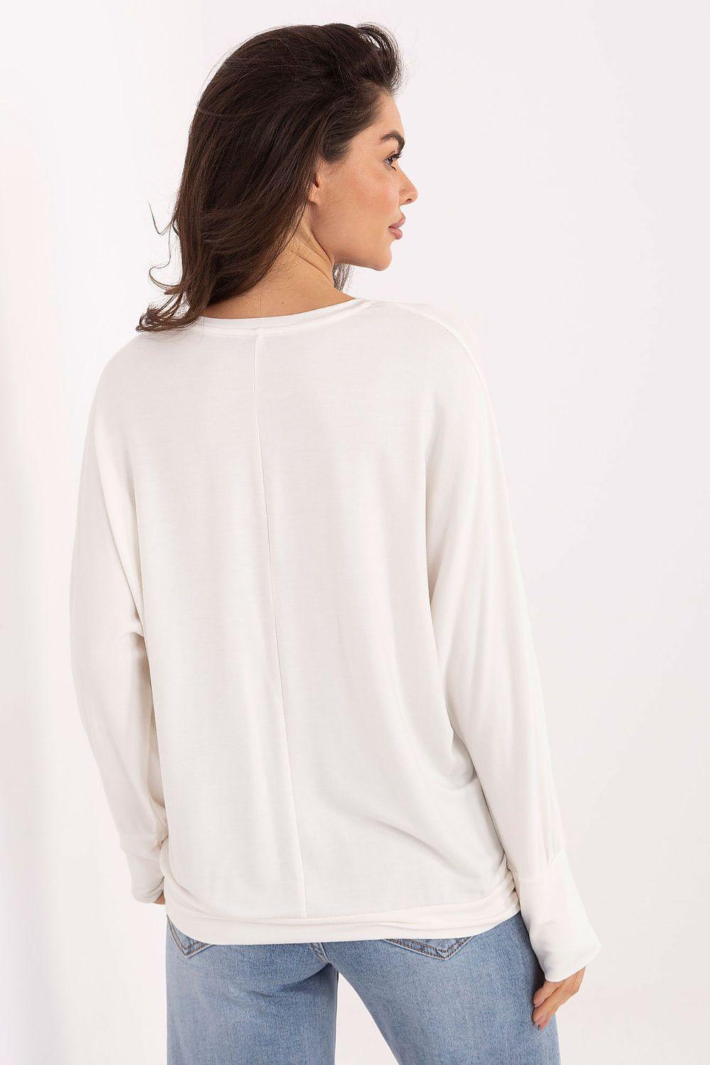 Beige long-sleeve blouse back view with relaxed fit and crew neck