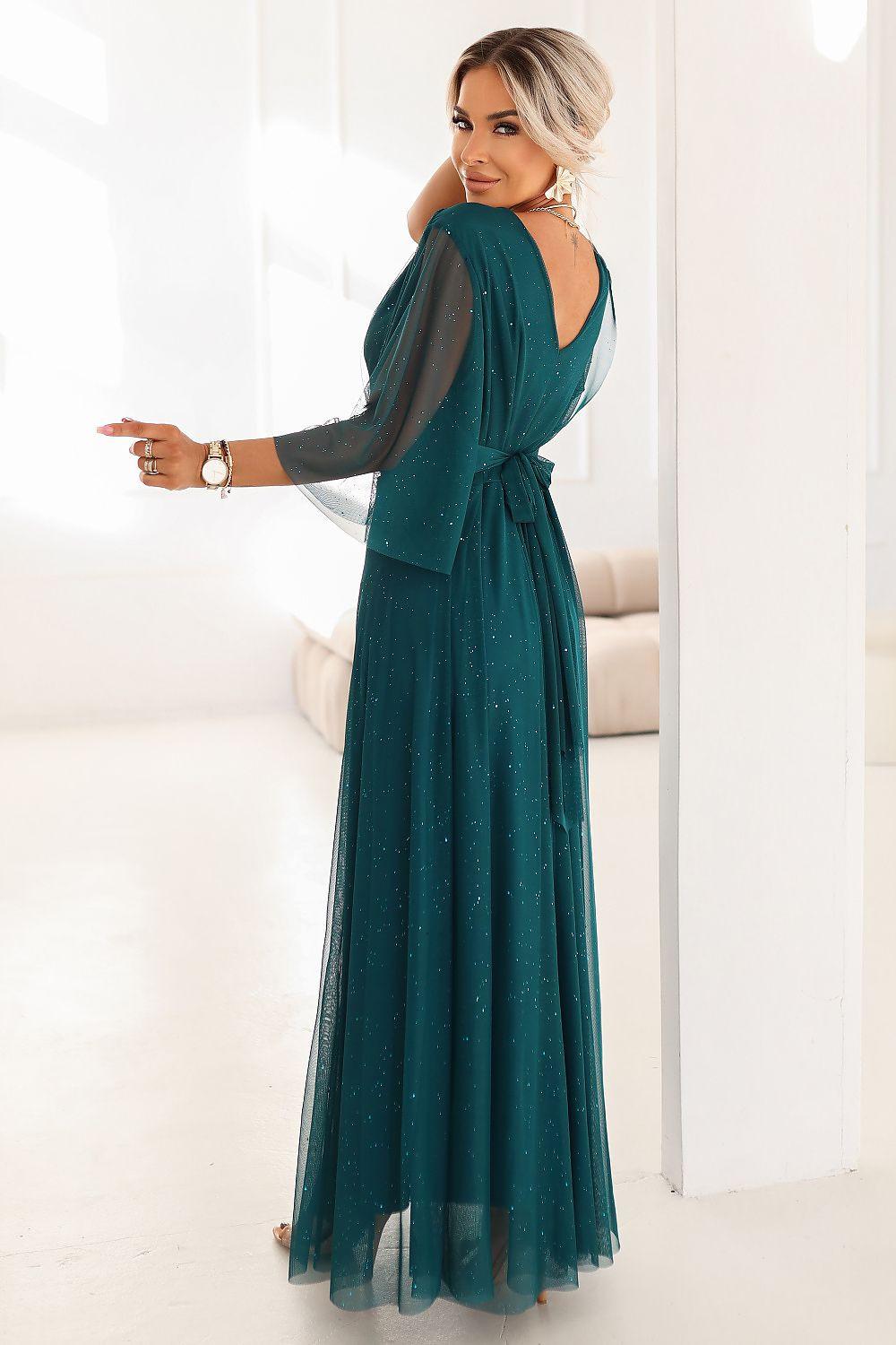 Sparkling tulle maxi dress with deep V-back and long sheer sleeves, flowing skirt