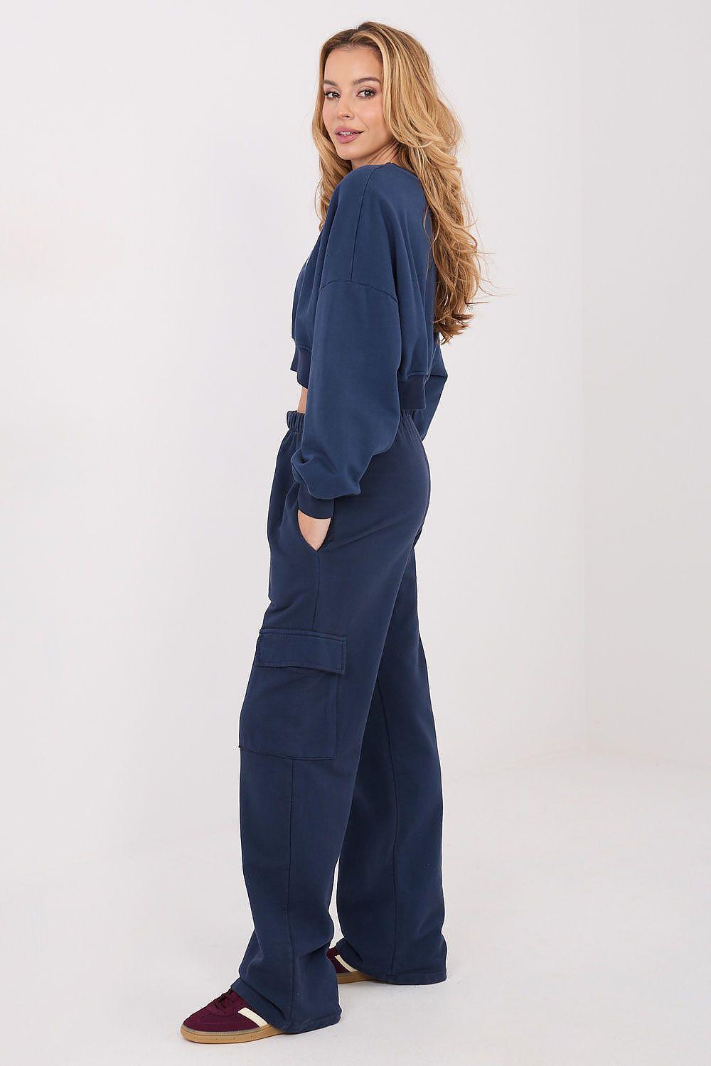 Navy blue cargo-style tracksuit trousers with side pocket detail, wide flared leg