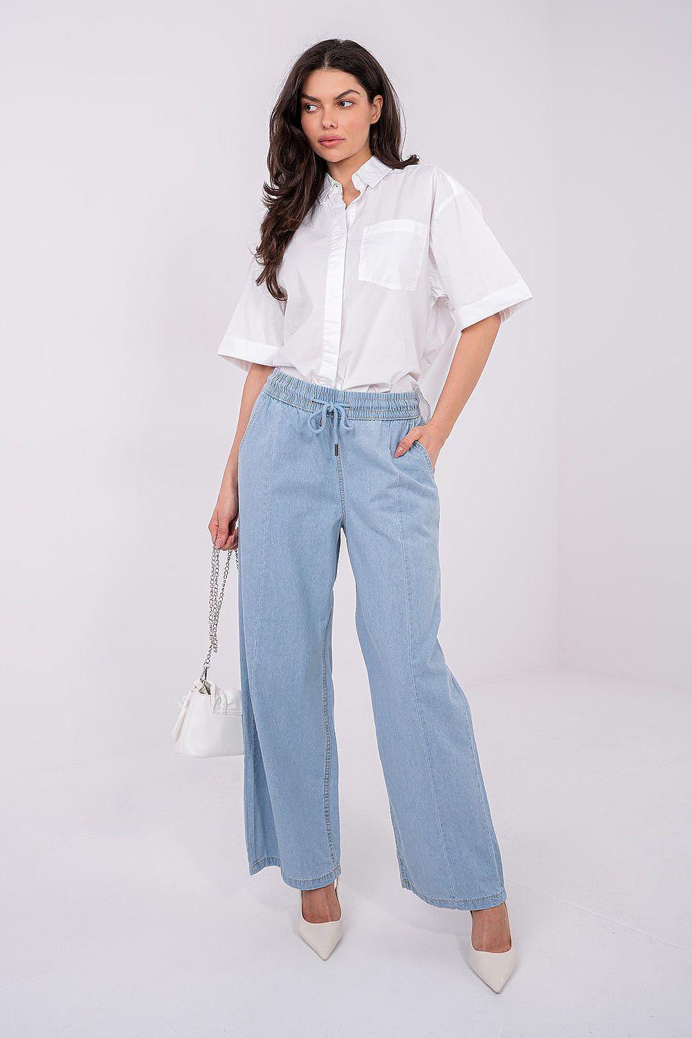 Light blue denim wide-leg jeans with straight legs, belt loops, and drawstring waist