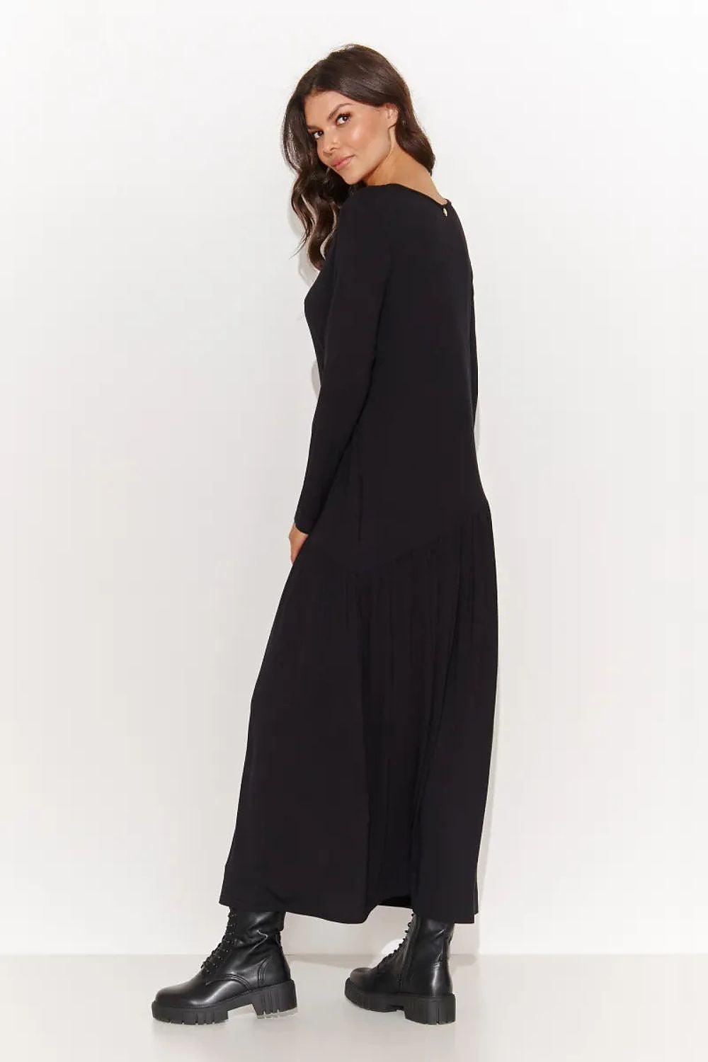 Black long-sleeve maxi daydress, side view with crew neck and draped hem