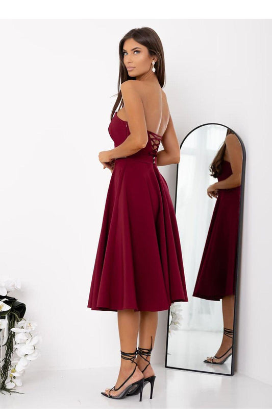 Evening dress, burgundy halter-style bodice with white belt and flared midi skirt