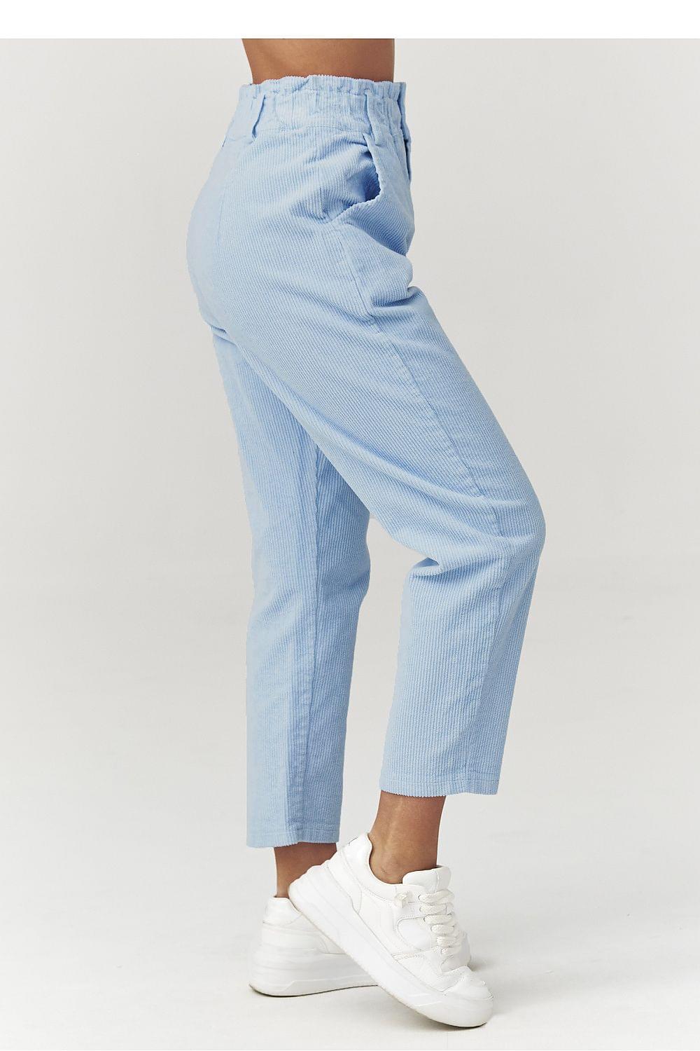 Light blue corduroy trousers, side view, cuffed cropped ankle length