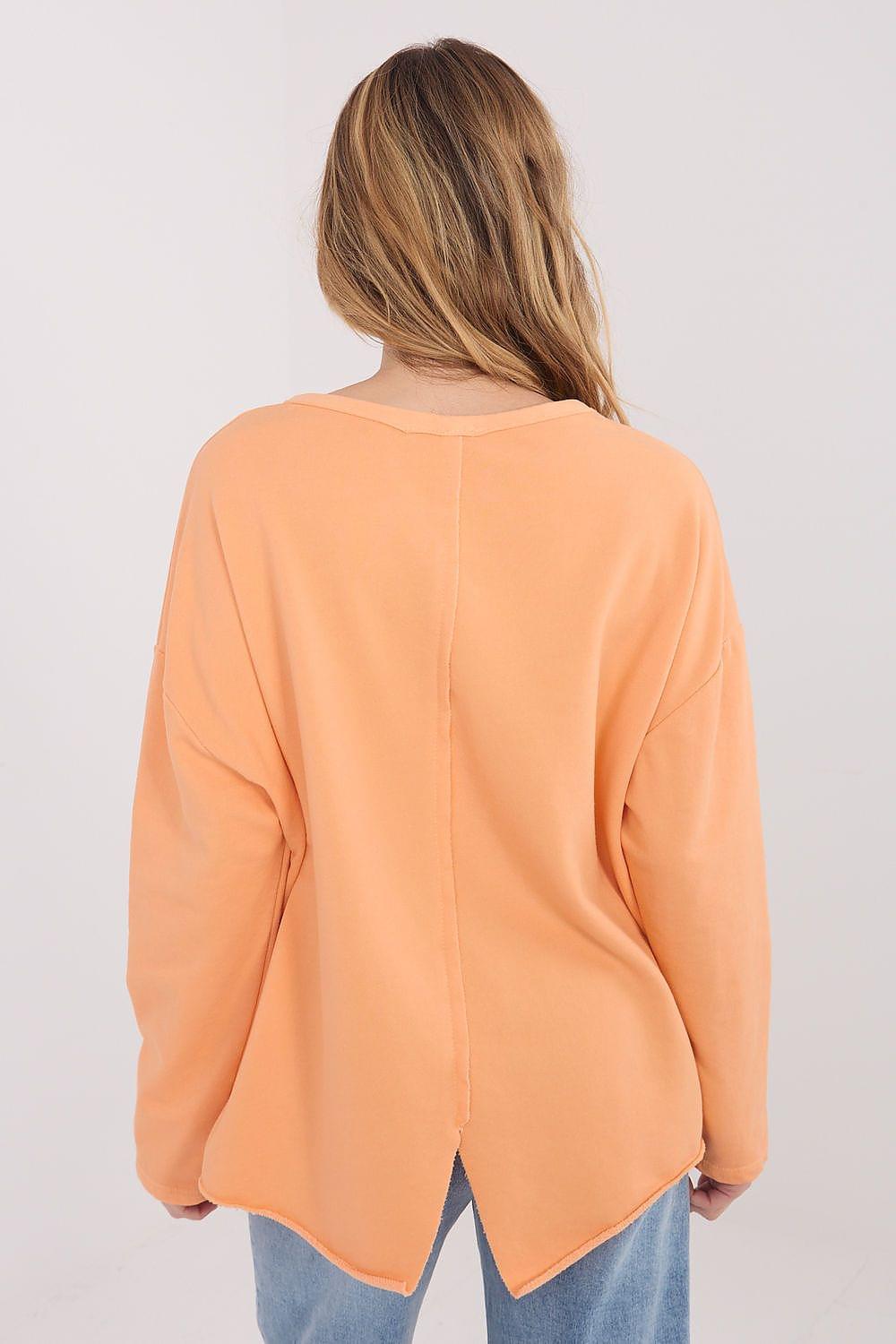 Orange blouse back view with long sleeves and rounded neckline; no front detail.