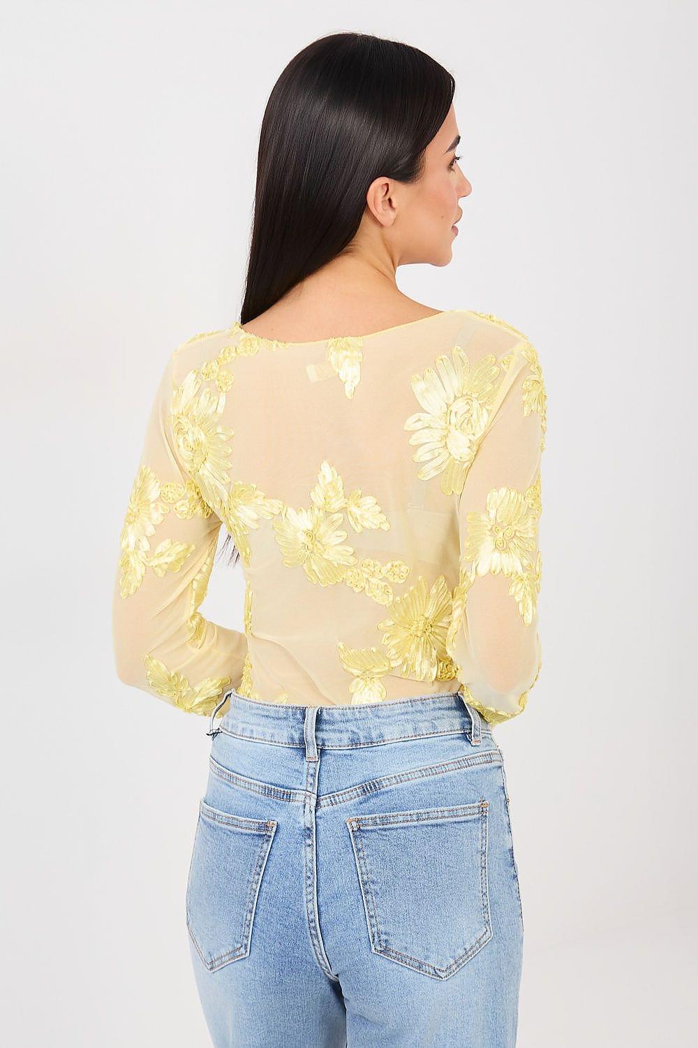 Yellow sheer blouse back view with gold floral print, long sleeves, round neck