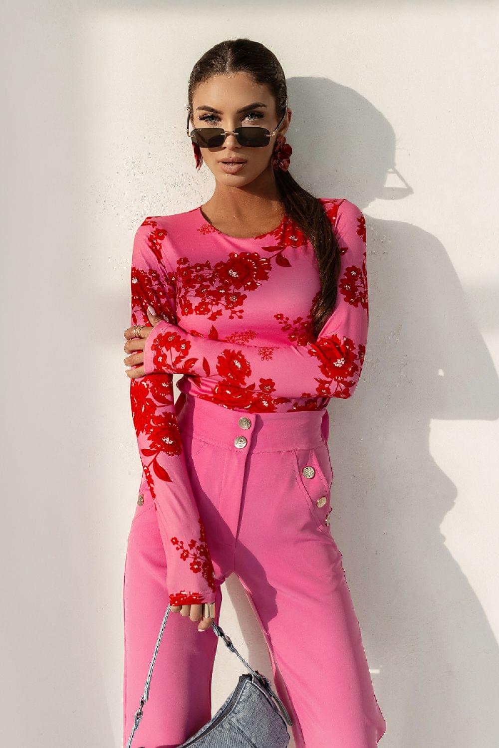 Red floral long-sleeve blouse with round neckline and close, body-hugging fit