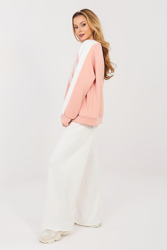 Pink sweatshirt and white wide-leg pants lounge set, side view with long sleeves