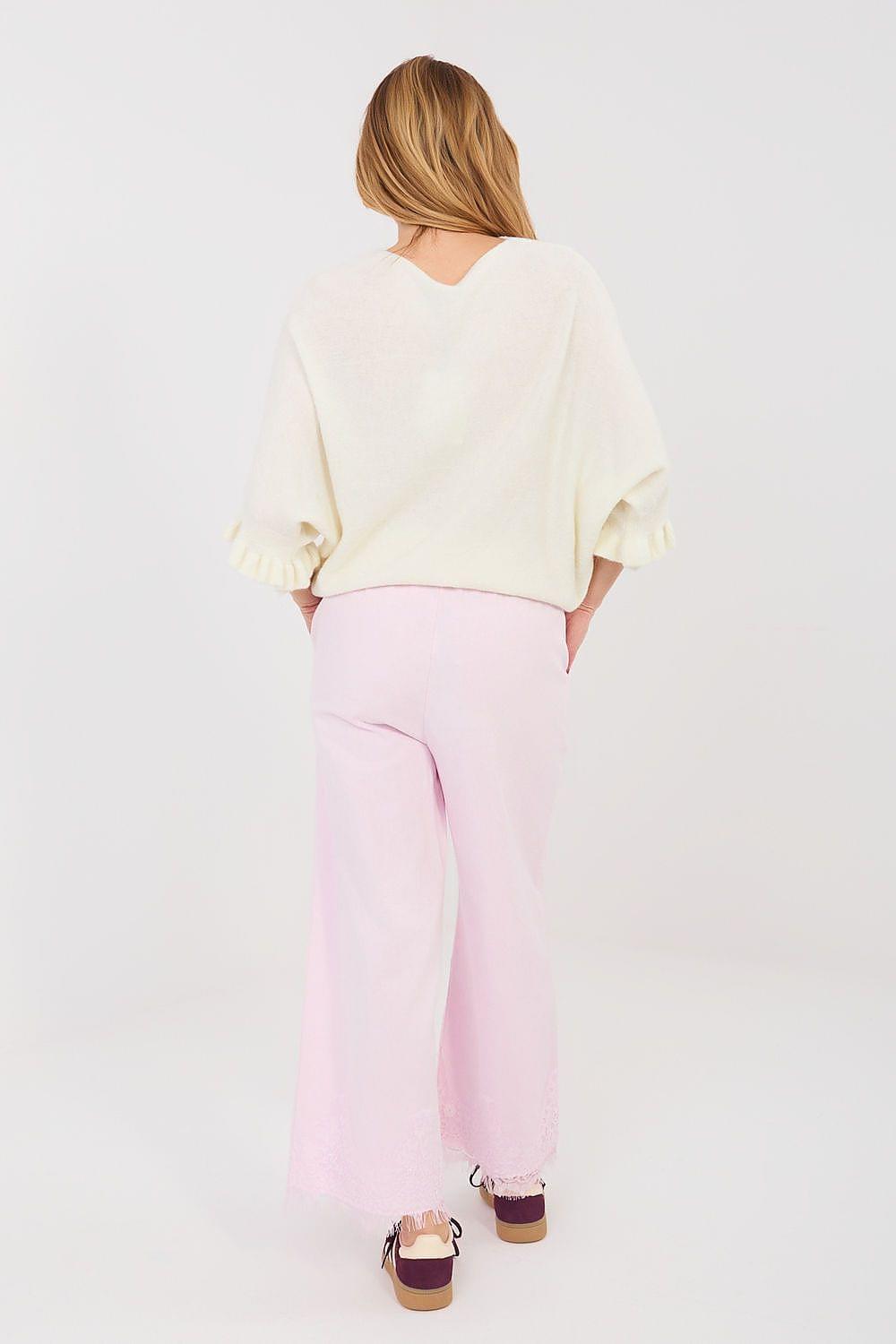 Light pink wide-leg jeans, back view, frayed hem and relaxed fit