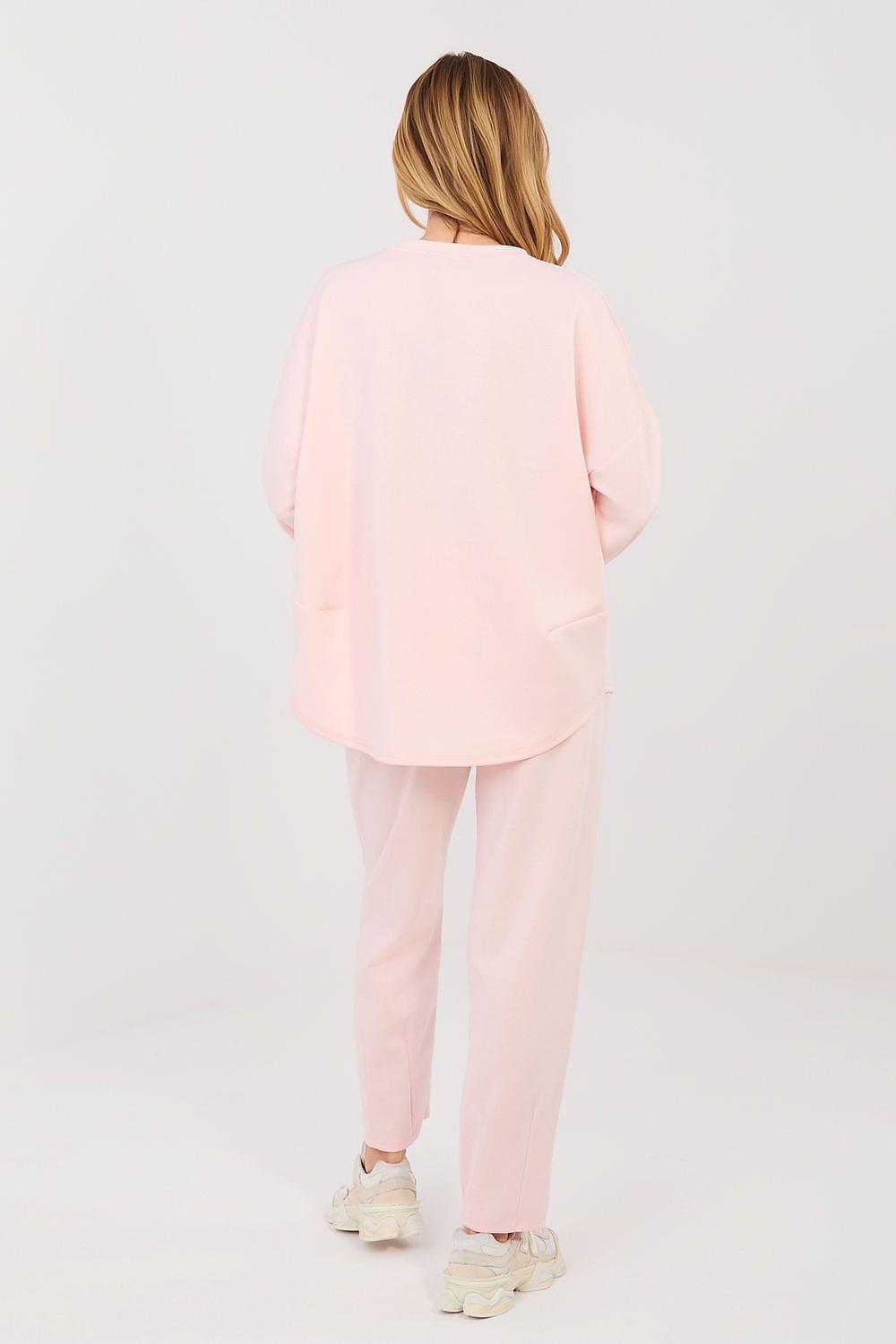 Pink two-piece outfit, back view: long-sleeve top and straight-leg pants