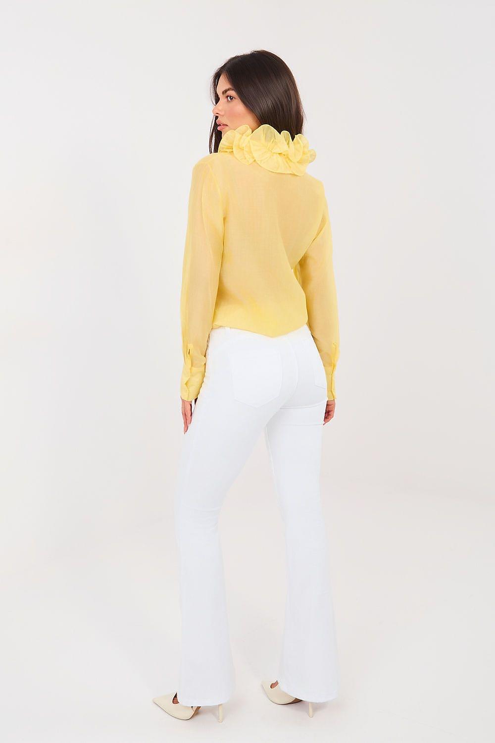 White jeans with a flared silhouette and full-length legs