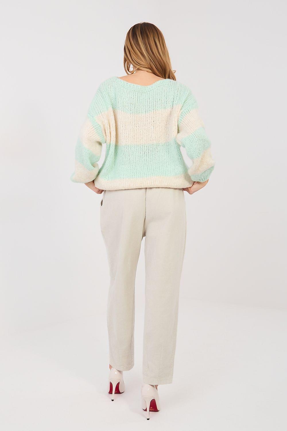 Beige corduroy trousers with tapered ankle-length leg and front pockets