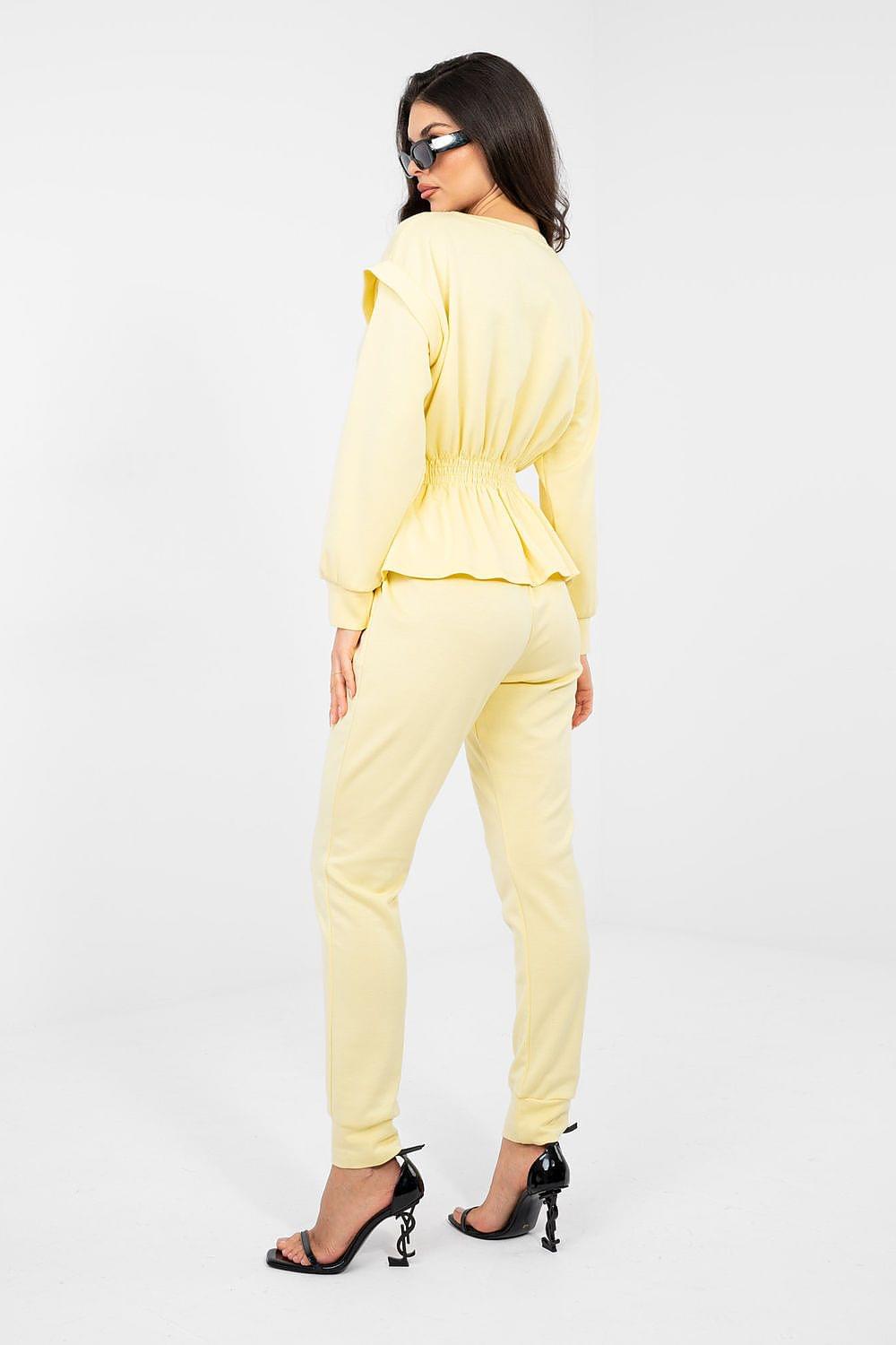 Yellow peplum long-sleeve top and jogger pants set, back view