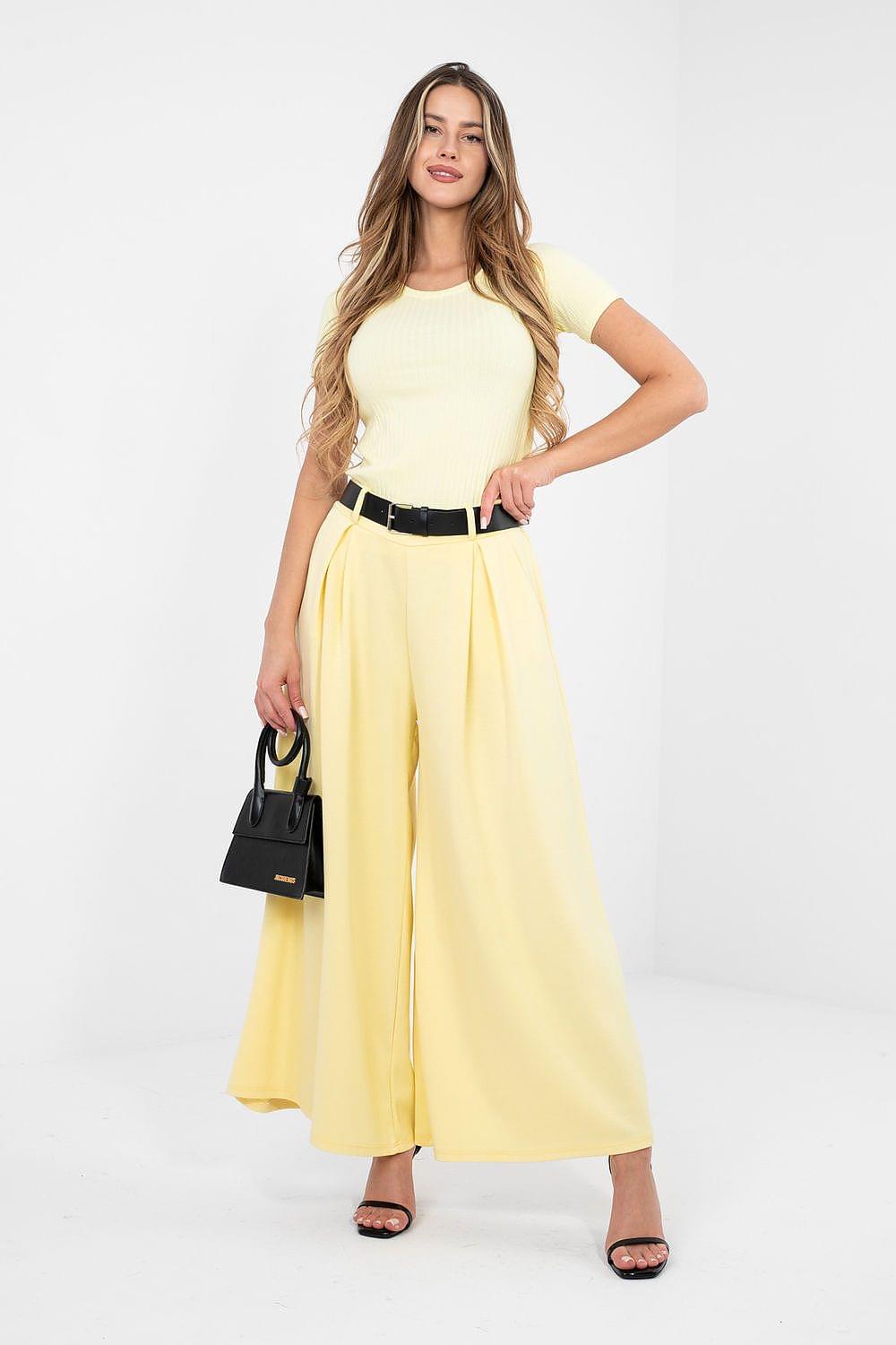 Yellow wide-leg tracksuit trousers with high waist belt and flowing wide legs