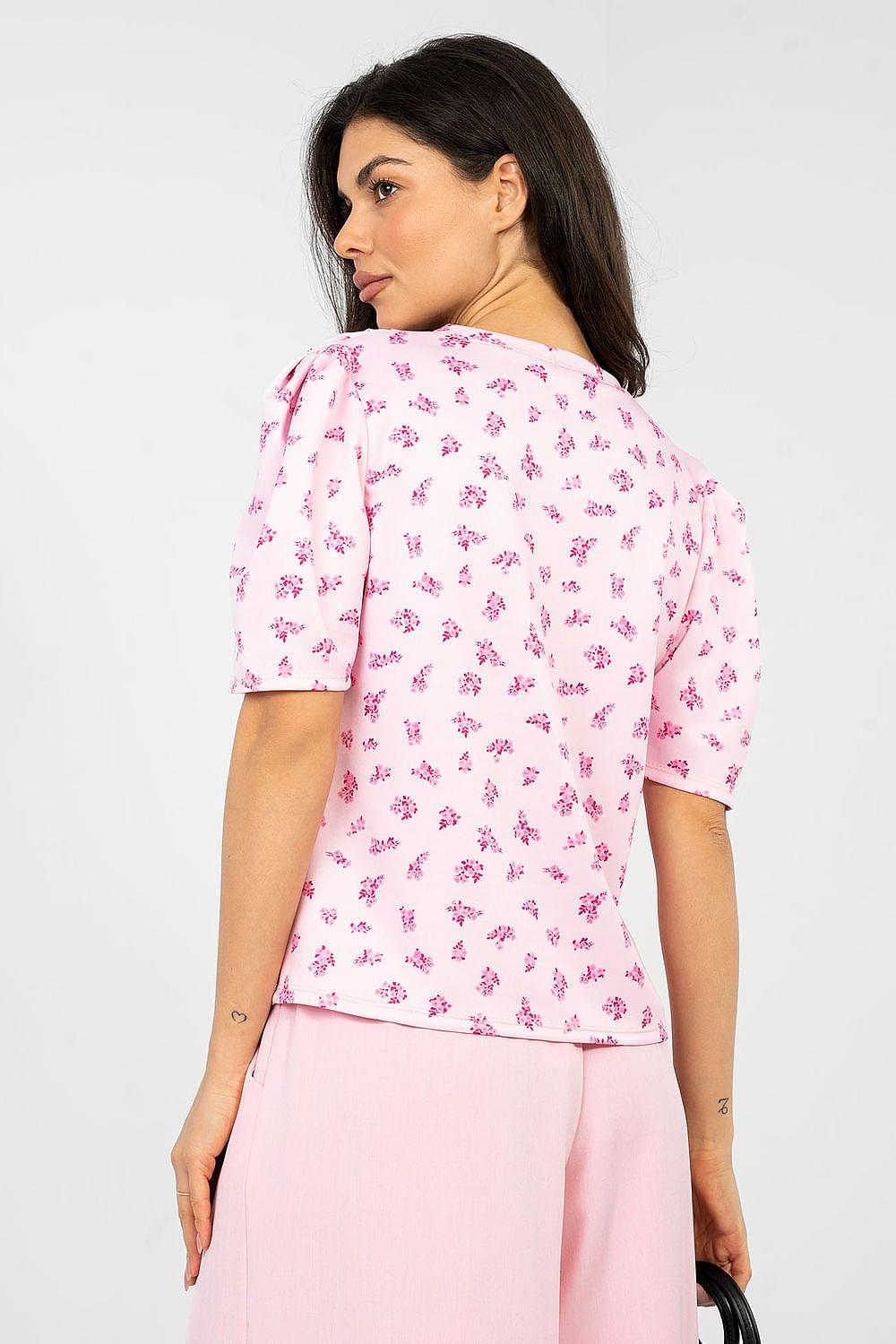 Pink floral blouse with short sleeves and round neckline, side view