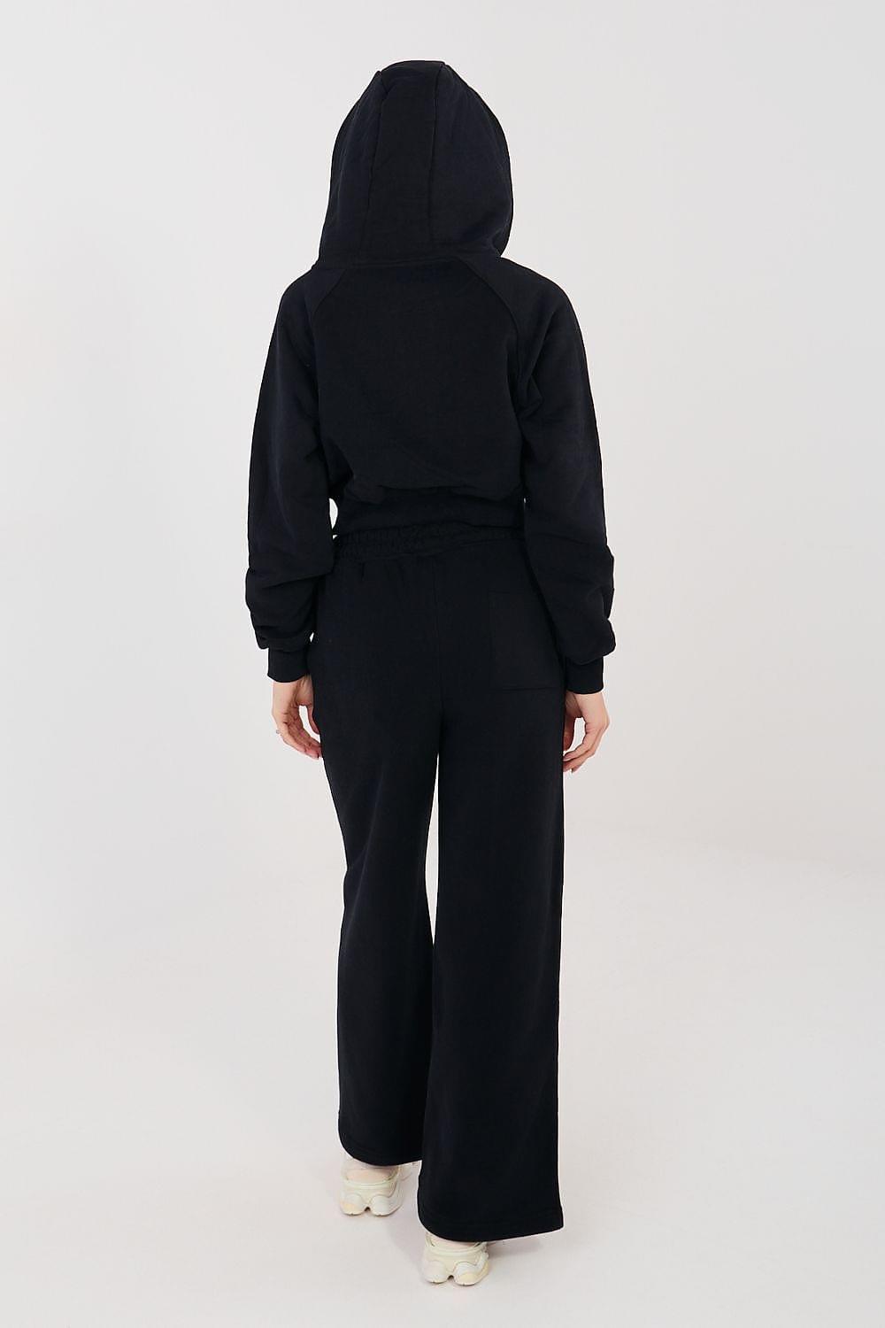 Black back view of hooded two-piece sweatshirt and wide-leg pants set