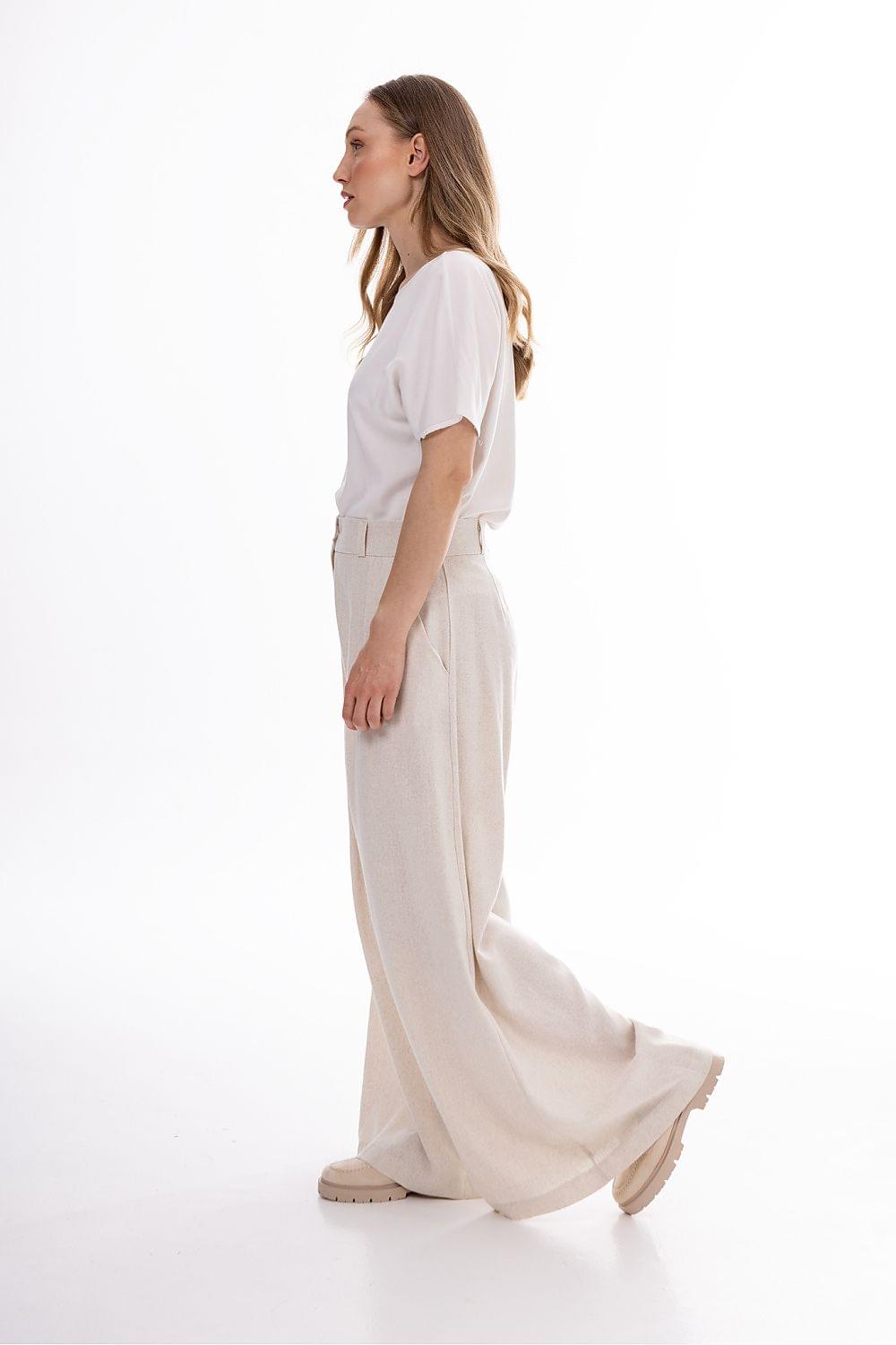Beige women’s wide-leg trousers with side pockets