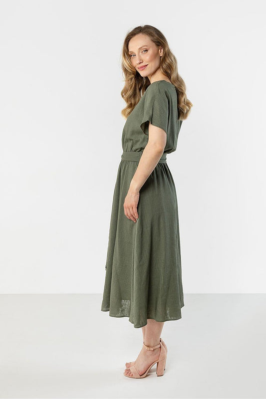 Awama daydress in dark green, short sleeves, gathered waist tie, midi skirt, side view