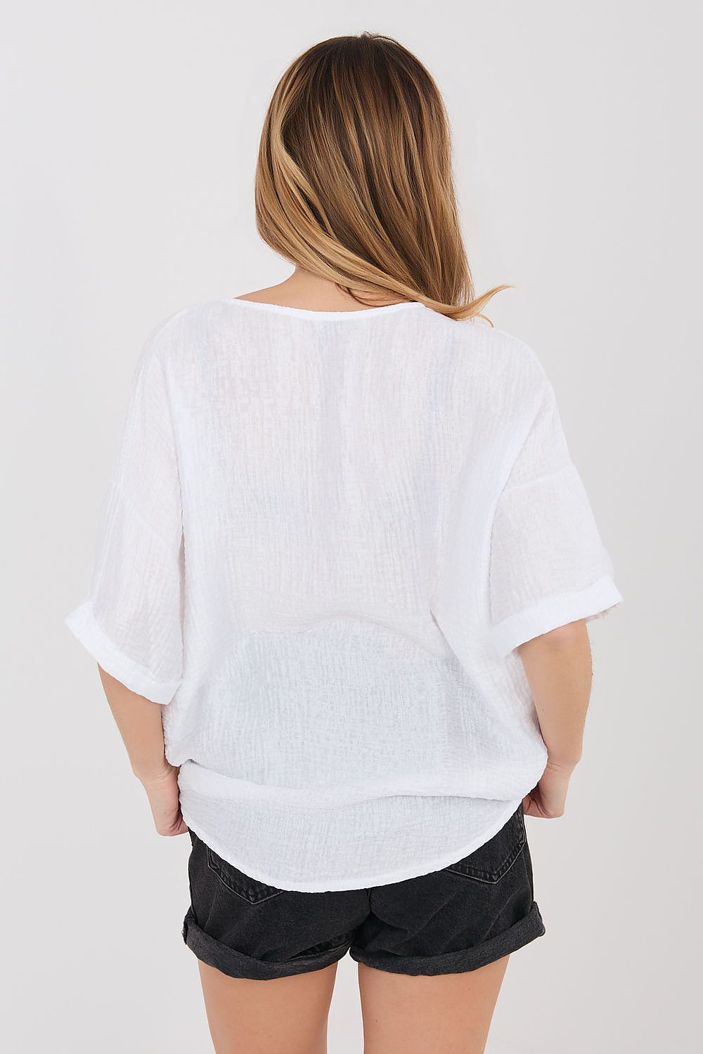 White short sleeve button-front shirt, back view