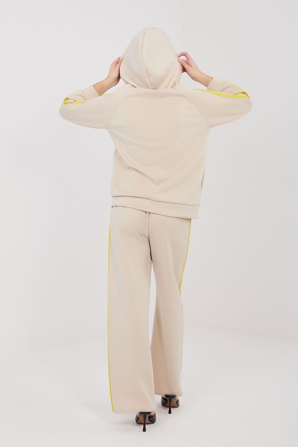 Beige tracksuit set with hood up and yellow trim, zip hoodie and matching pants