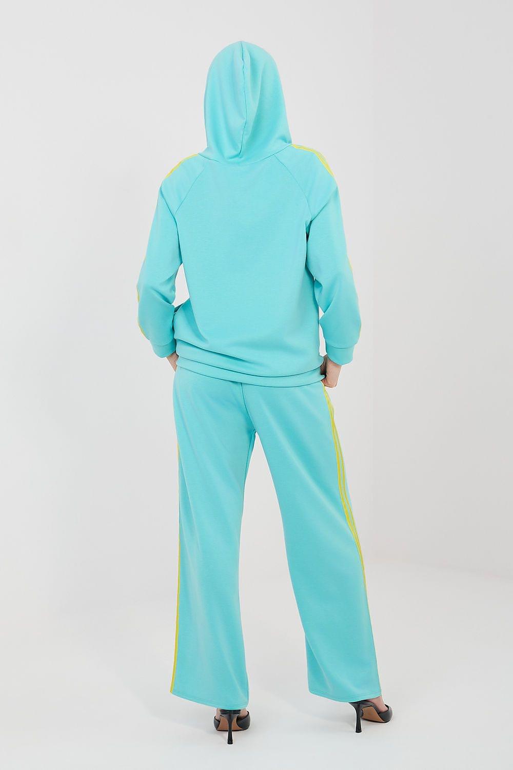Women’s turquoise back-view hoodie set with yellow piping and wide-leg pants