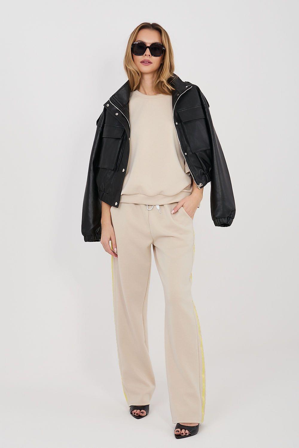 Beige sweatshirt and wide-leg pants set with black zip jacket, drawstring waist