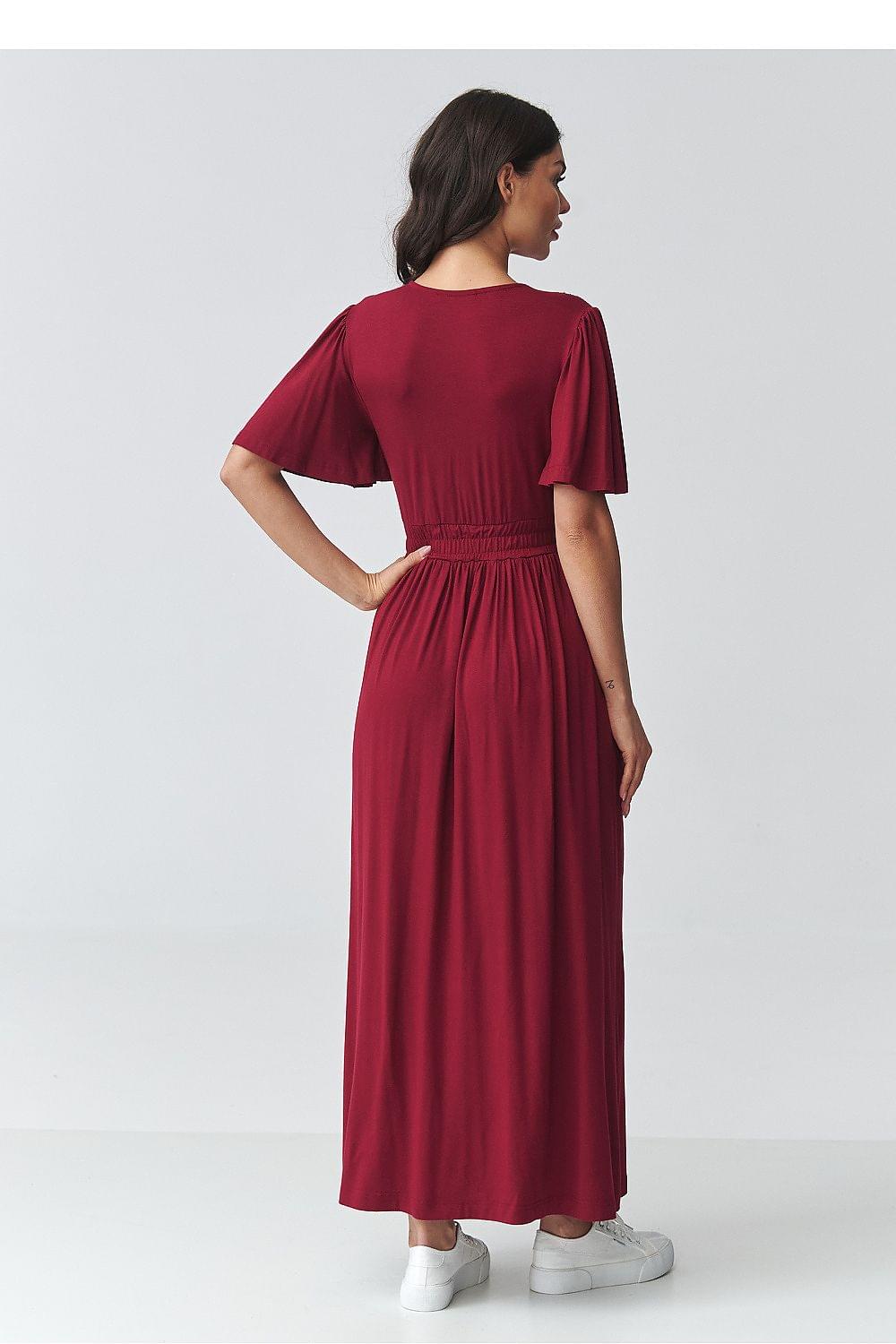 Red back view maxi daydress with gathered waist and short flutter sleeves.