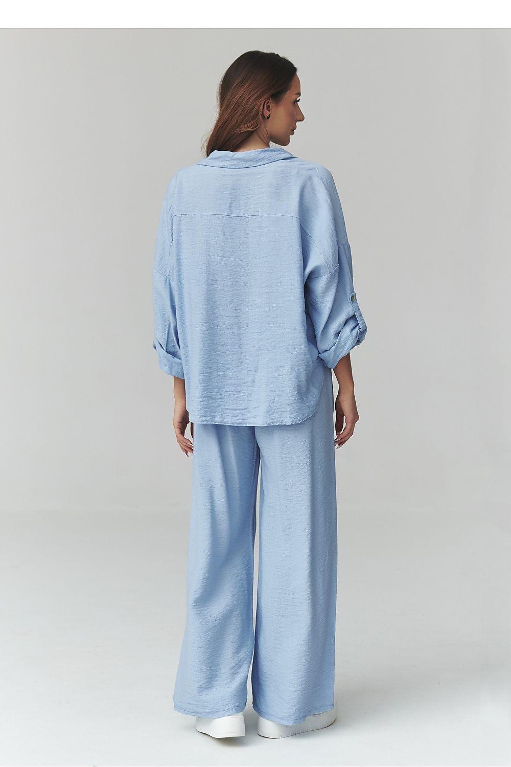 Light blue two-piece set with button-up blouse and wide-leg trousers, back view
