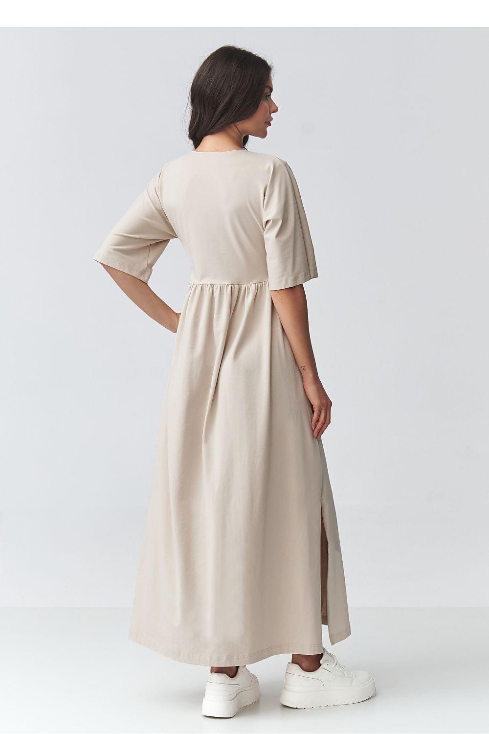 Cream-beige daydress with back yoke, half sleeves, and gathered waist skirt