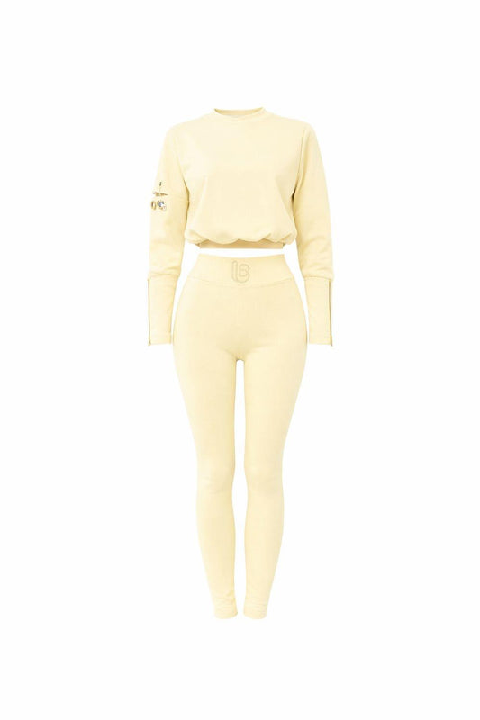 Light yellow two-piece set with crewneck sweatshirt and matching slim pants