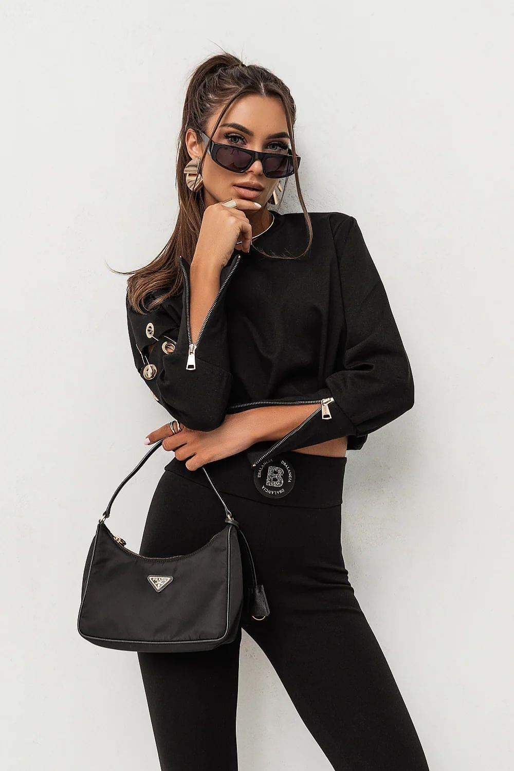 Black long-sleeve top and matching pants set, cropped waist logo patch