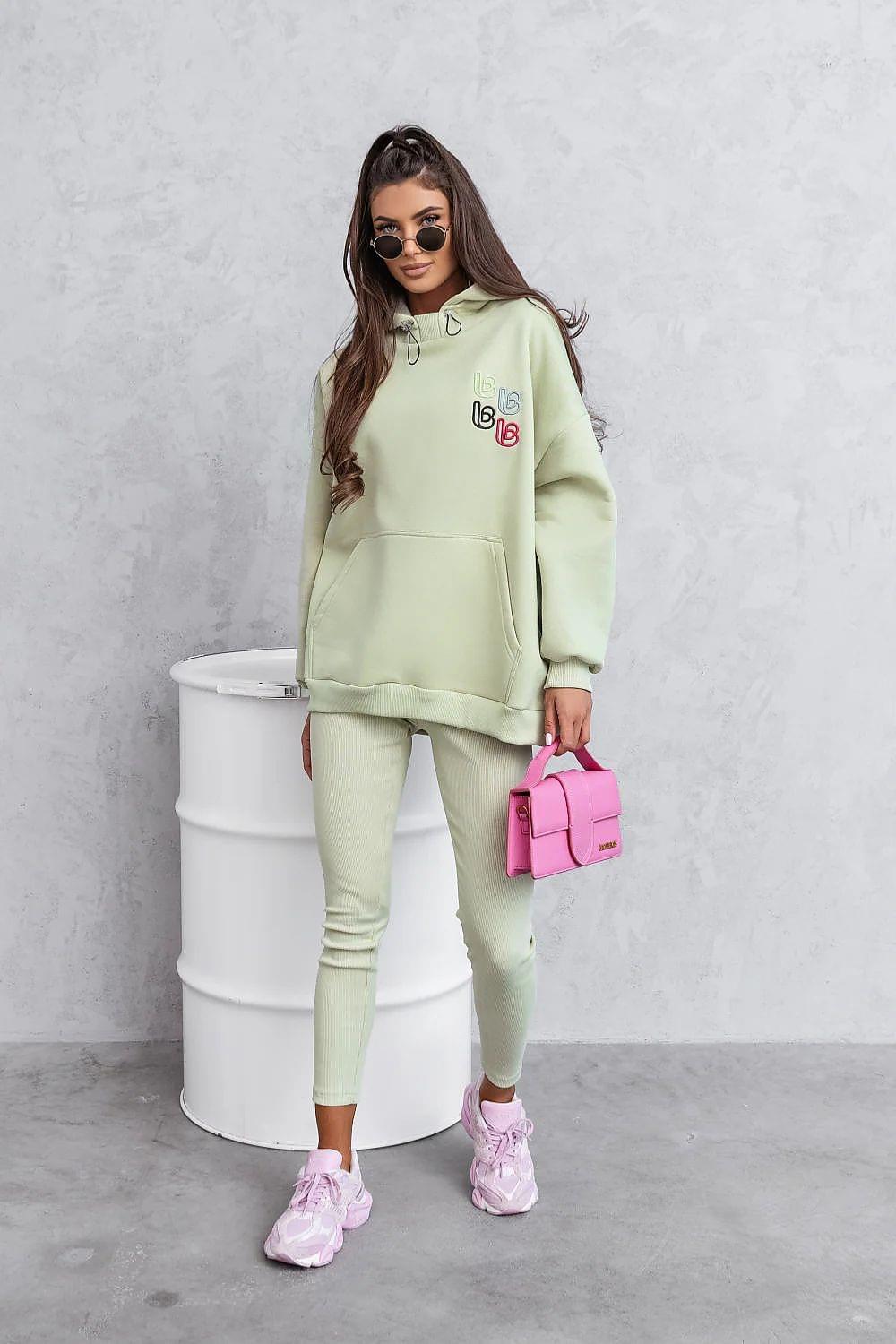 Two-piece hoodie and jogger set in light green, long sleeves and tapered pant legs