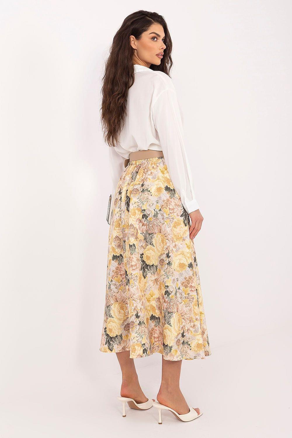 Yellow floral midi skirt, A-line silhouette with gathered waistband and knee-length hem.