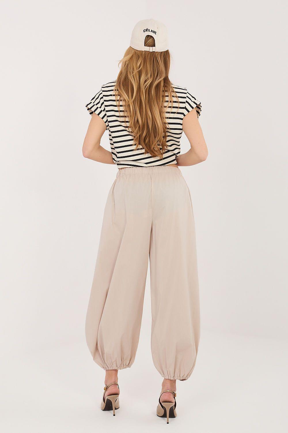 Women’s beige balloon trousers, loose fit with elastic cuffs and gathered waist