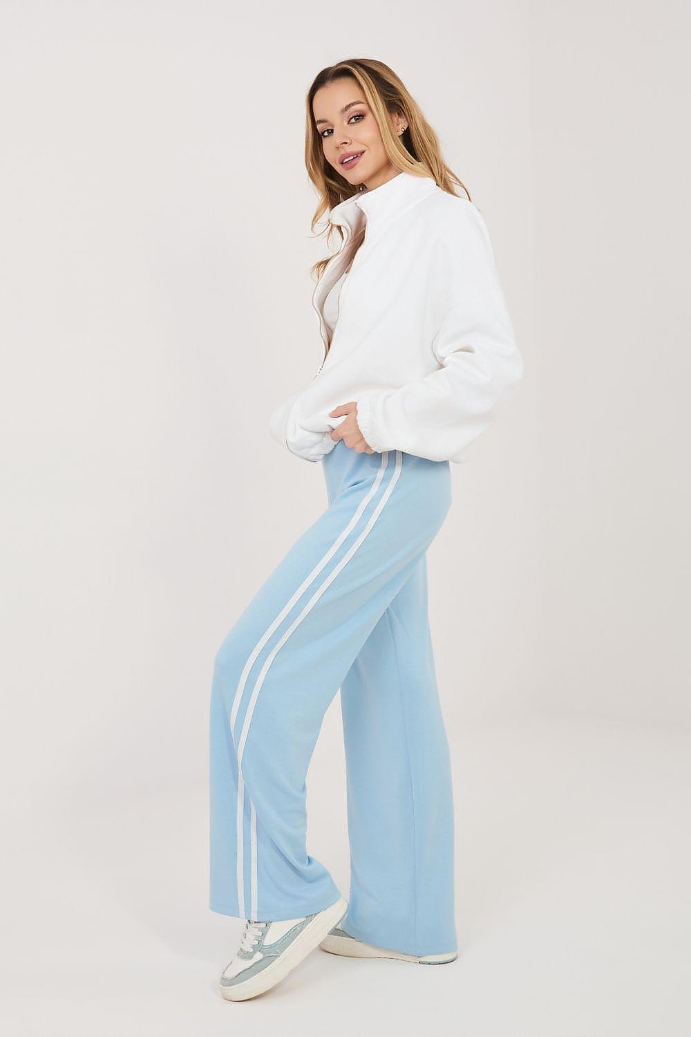 Light blue tracksuit trousers with white side stripes and elastic cuffs, wide-leg