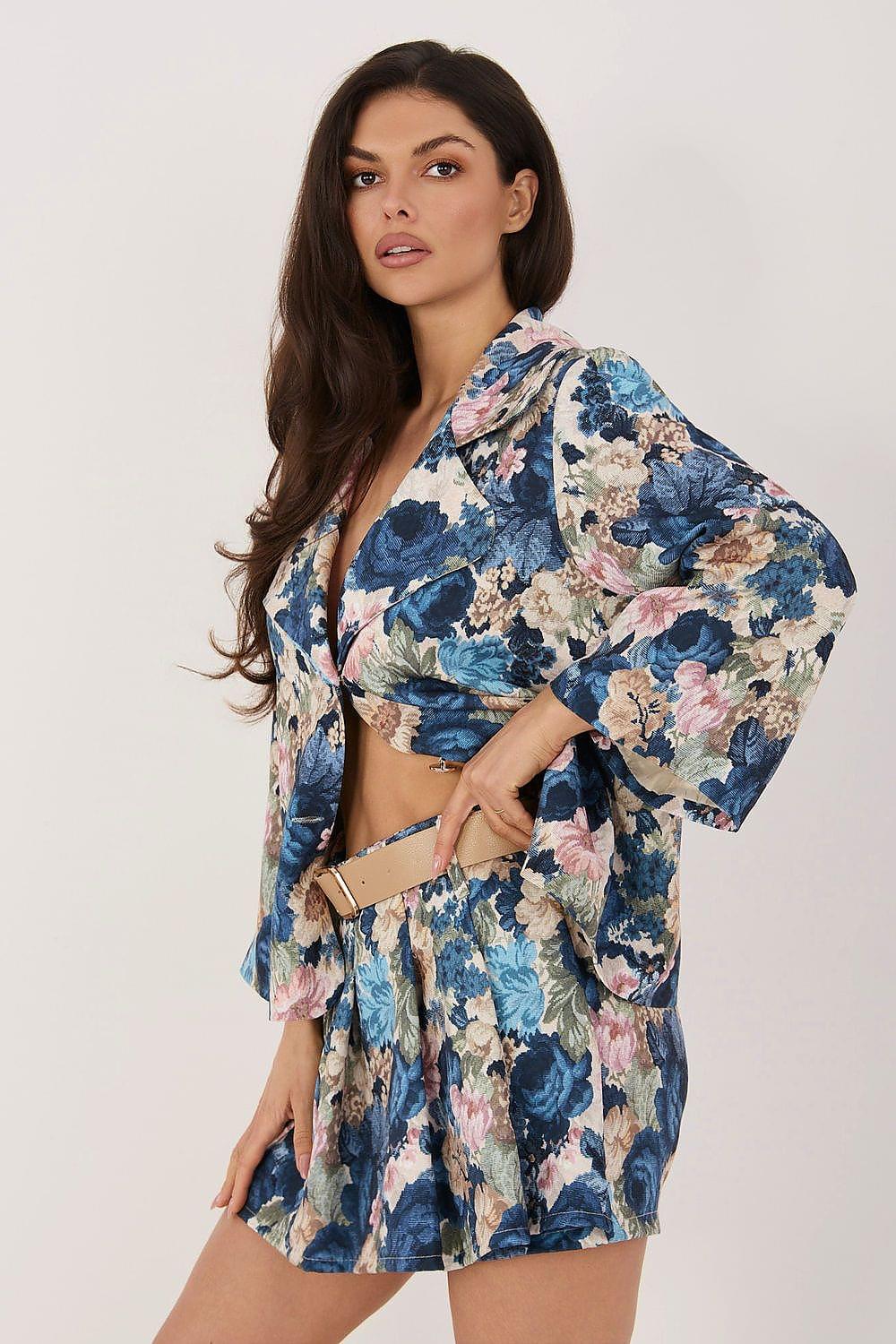 Blue floral skort with pink and cream flowers, short flared skirt over shorts