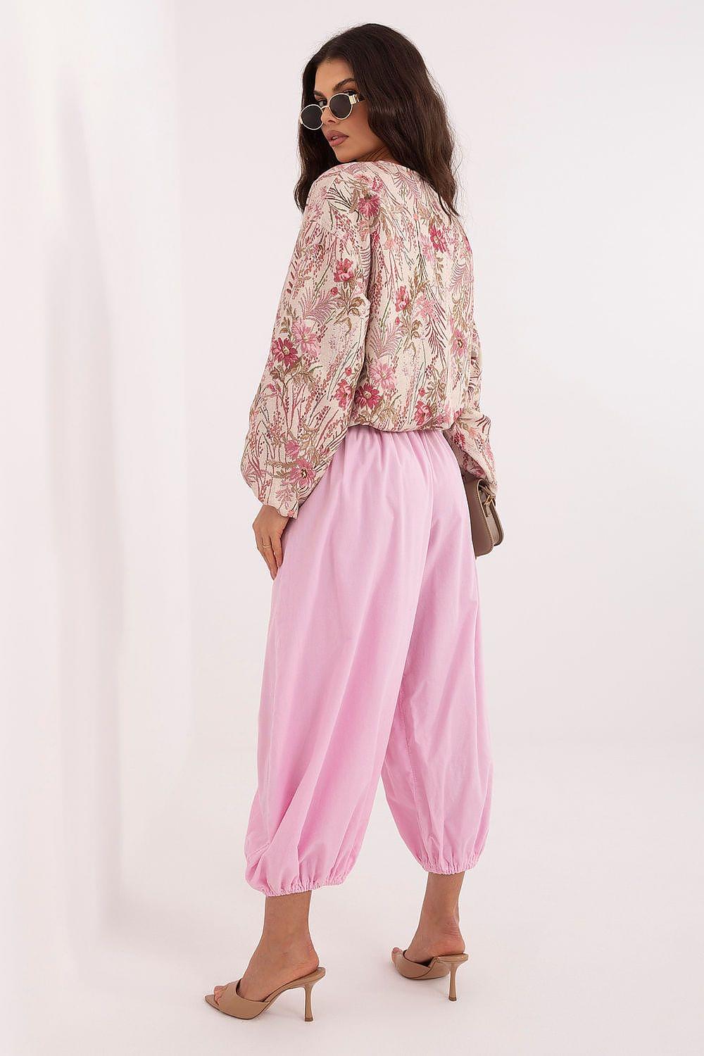Pink wide leg trousers with elastic waistband and gathered ankle cuffs