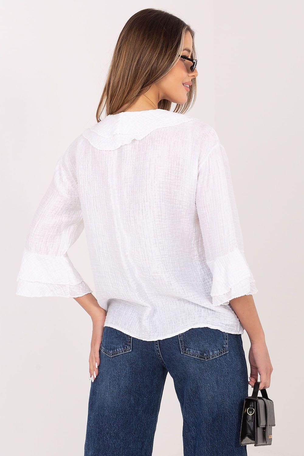 White long-sleeve shirt back view with wide collar and flared cuffs